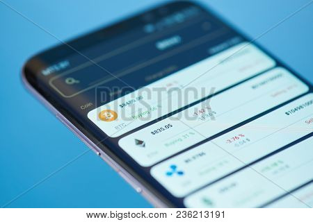 New York, Usa - February 13, 2018: Current Prices On Cryptocurrencies On Modern Mobile Smartphone Sc