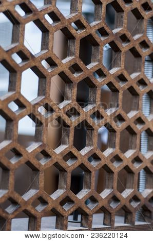 The Texture Of A Modern Wall With Multi-faceted Holes. Selective Focus.