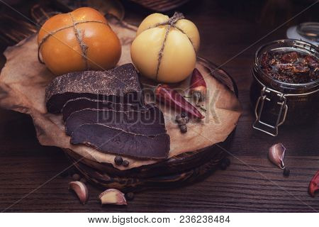 Beef jerky on wooden background