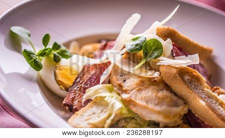 Caesar Salad With Egg Lettuce Bacon Crutons Grill Chicken Breast And Parmesan Cheese