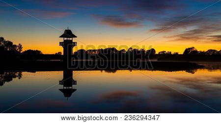 Still Waters At Henley Lake Park, Masterton, New Zealand At Dawn.