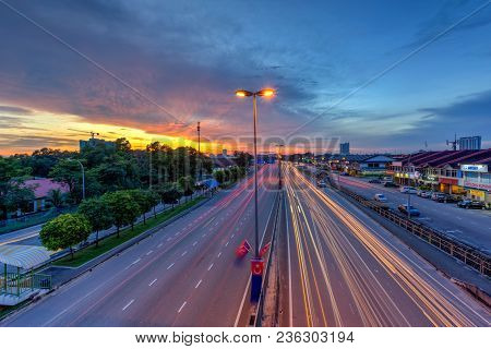 1 Dec 2017 Taman Perlin, Johor Bahru, Malaysia :light Trails At Blue Hour On Road Of Traffic Lights 