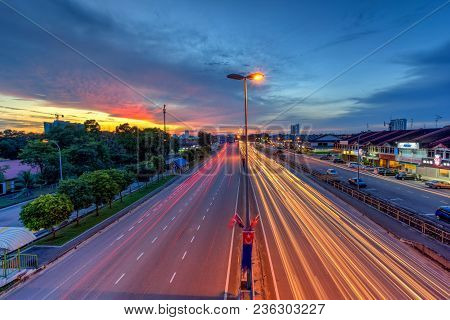 1 Dec 2017 Taman Perlin, Johor Bahru, Malaysia :light Trails At Blue Hour On Road Of Traffic Lights 