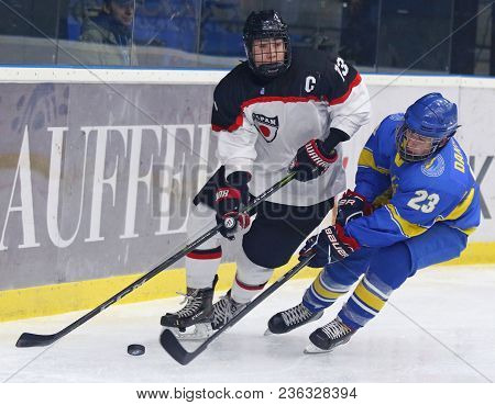 Kyiv, Ukraine - April 14, 2018: Riku Ishida Of Japan (l) Fights For A Puck With Dmytro Danylenko Of 