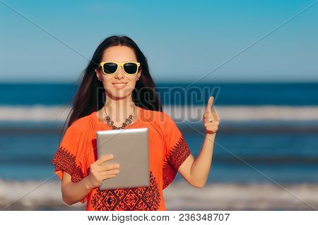 Happy Girl With Pc Tablet On The Beach