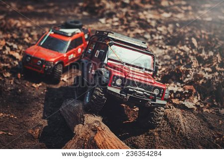 Kiev, Ukraine - April, 2018 : Radio-controlled Model Of An Off-road Car, Trophy Crossing The Road Ro