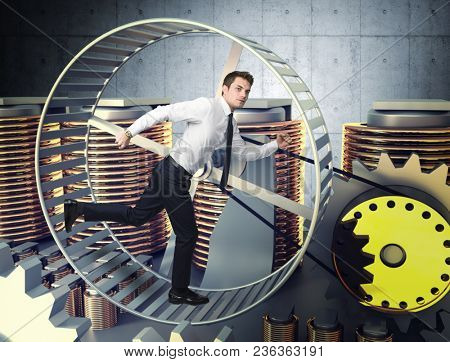 businessman man run inside of hamster wheele to produce energy