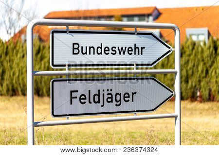 German Bundeswehr And Feldjaeger Sign Near A Barrack. Bundeswehr Means German Armed Forces And Feldj
