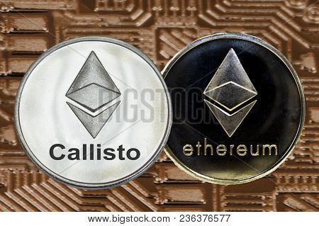 Ethereum And Callisto Coins On Gold Circuit Background. Cryptocurrency Eth Clo.