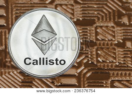 Callisto Coins On Gold Circuit Background. Cryptocurrency Clo.