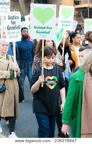 London, United Kingdom, 14th April 2018:- Marchers On A Silent March From Kensington Town Hall To Th