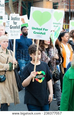 London, United Kingdom, 14th April 2018:- Marchers On A Silent March From Kensington Town Hall To Th