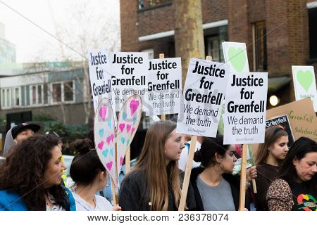 London, United Kingdom, 14th April 2018:- Marchers On A Silent March From Kensington Town Hall To Th