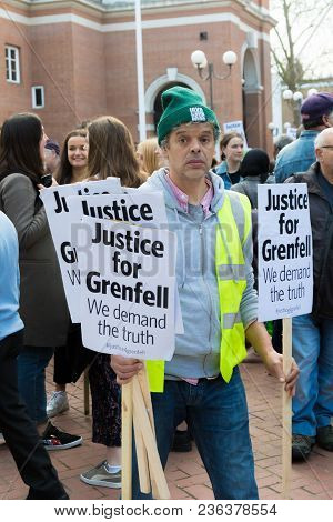 London, United Kingdom, 14th April 2018:- Marchers On A Silent March From Kensington Town Hall To Th