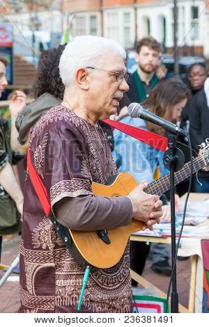 London, United Kingdom, 14th April 2018:- Performers Before A Silent March From Kensington Town Hall