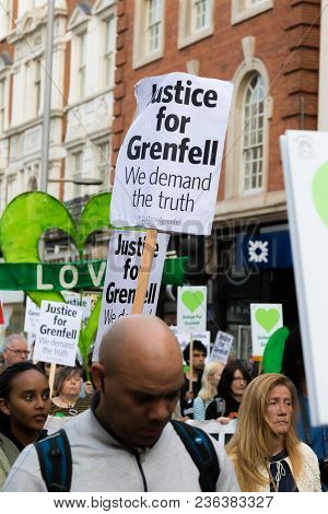 London, United Kingdom, 14th April 2018:- Marchers On A Silent March From Kensington Town Hall To Th