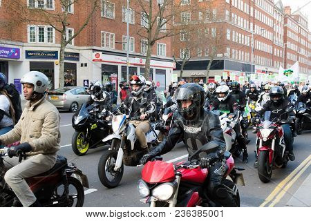 London, United Kingdom, 14th April 2018:- Bikers Leading A Silent March From Kensington Town Hall To