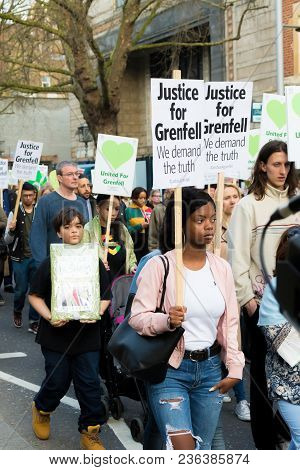 London, United Kingdom, 14th April 2018:- Marchers On A Silent March From Kensington Town Hall To Th