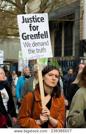 London, United Kingdom, 14th April 2018:- Marchers On A Silent March From Kensington Town Hall To Th