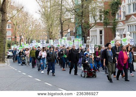 London, United Kingdom, 14th April 2018:- Marchers On A Silent March From Kensington Town Hall To Th