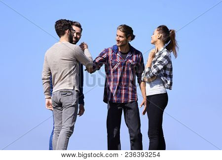 welcome .the handshake of the fellow students