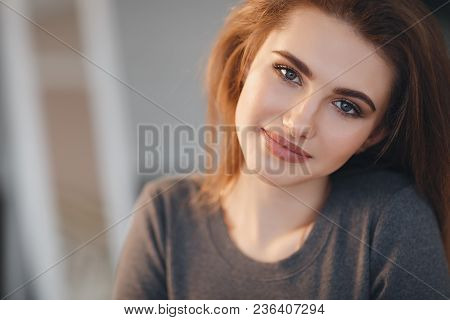 Beautiful Sexy Girl In An Elegant Gray Sweater. Close-up, Portrait Of A Beautiful Woman, Model, Indo