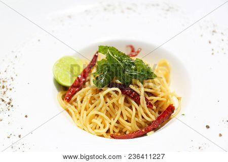 Spaghetti With Dry Chilli, Bacon Lime And Garlic