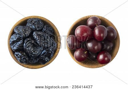 Fresh Plums And Dried Prunes Isolated On A White Background. Dried Prunes And Fresh Plums In A Bowl 
