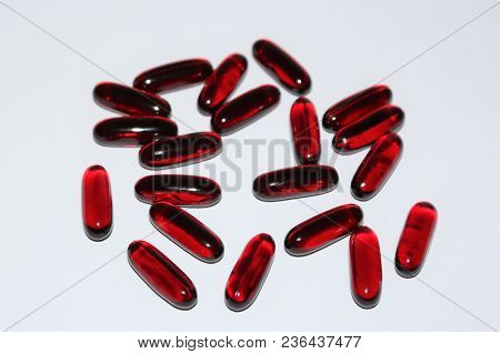 Black Cumin Oil. Black Cumin Oil Capsules Isolated On White Background. Medical Black Cumin.