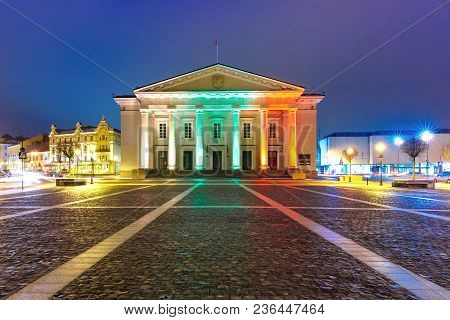 Town Hall Square In Old Town Illuminated By The Colors Of The National Lithuanian Flag At Night Of V