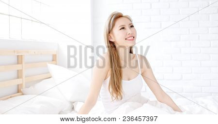 Woman Wake Up On Bed In The Morning