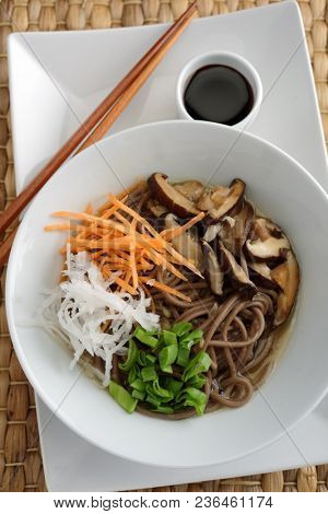 Japanese shiitake, soba, and vegetables soup