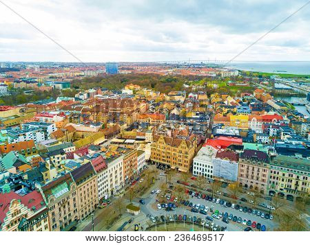 Aerial Malmo City View From Above With Harbour, Turning Torso And The Bridge On The Horizon