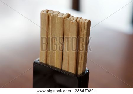 Wooden Stir Sticks On Table, Coffee Shop