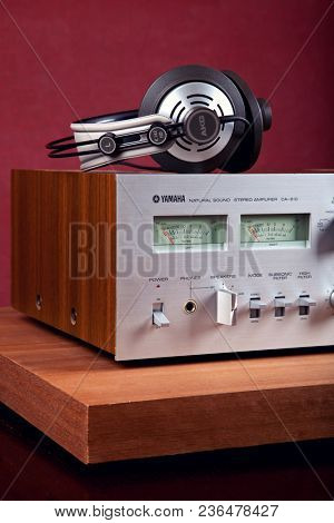 Vintage Stereo Amplifier Frontal Panel with VU meters and Headphones Closeup 