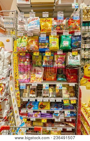 ROME, ITALY - CIRCA NOVEMBER 2017: an assortment of candy and chocolate in Carrefour Express store in Rome.