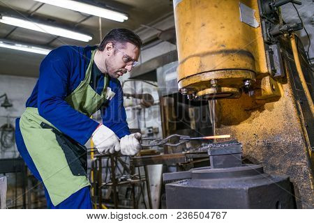 Brutal Man Forges Iron