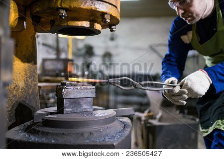 The Brutal Man Works In The Workshop