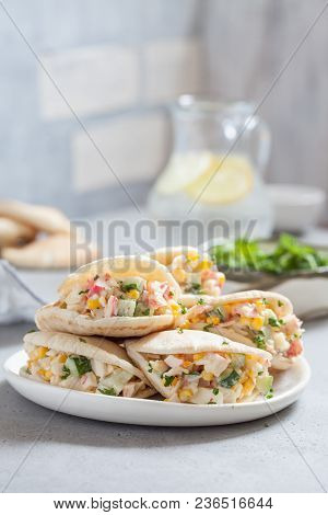 Stuffed Pita Bread With Crab Salad On Table.