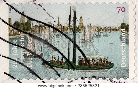 Luga, Russia - February 08, 2018: A Stamp Printed By Germany Shows Famous Steamboat Weser - The Firs