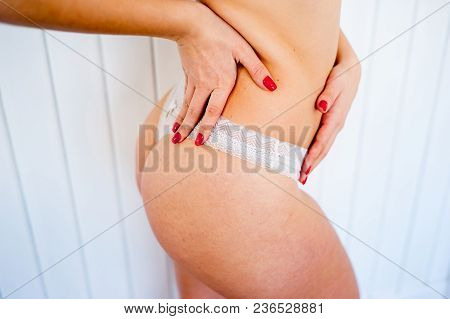 A Portrait Of A Beauriful Woman In A Lingerie