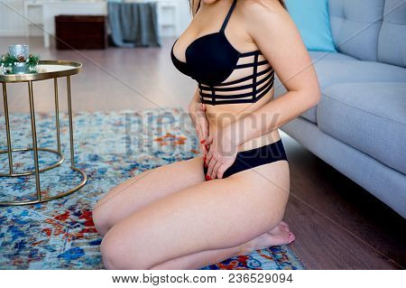 A Portrait Of A Beauriful Woman In A Lingerie