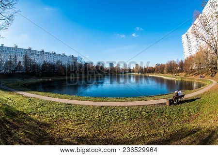 City Public Park With Lake In Summer Day