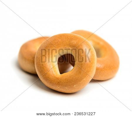 Small pile of bagels isolated on white