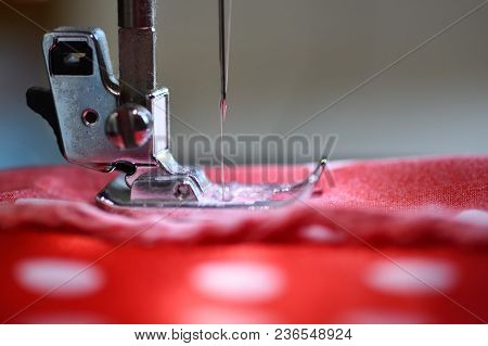 Sewing Machine Foot On Material With Threaded Needle Ready To Sew. Garment Industry, Designer Atelie