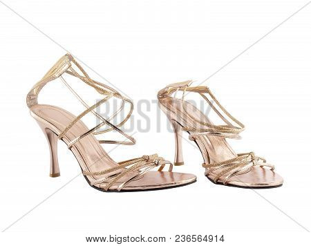 pair of beige high heel sandal shoes with glitter strap and zipper isolated on white background, sexy women strappy footwear, luxury femininity clothing fashionable
