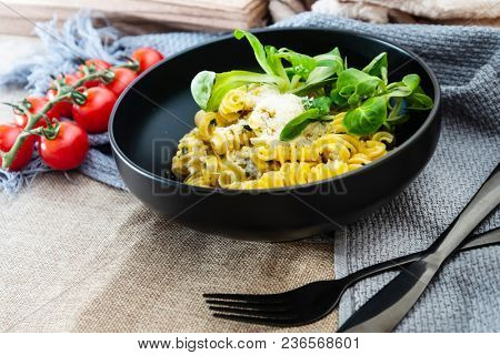 Radiatori pasta in a creamy tomato parmesan cheese sauce