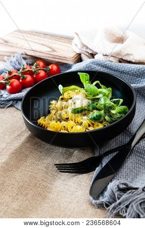 Radiatori pasta in a creamy tomato parmesan cheese sauce