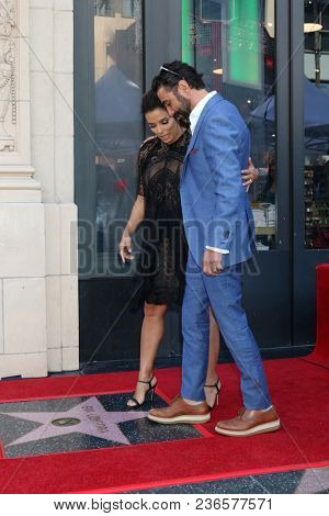 LOS ANGELES - APR 16:  Eva Longoria Baston, Jose Baston at the Eva Longoria Baston Star Ceremony on the Hollywood Walk of Fame on April 16, 2018 in Los Angeles, CA