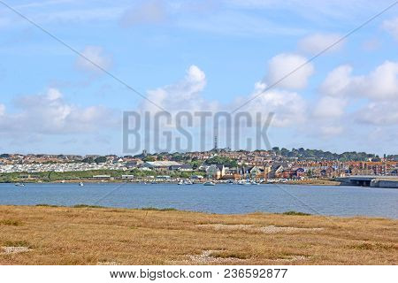 Wyke Regis Town From Across The Fleet Basin, Dorset